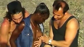 Interracial Threesome With An African Woman At The Beach