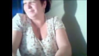 Amateur Grandma Flaunts Her Assets On Webcam