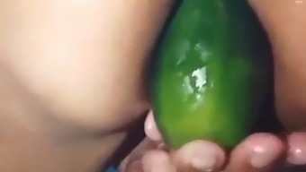 Stepmom Flaunts Her Open Ass By Using A Large Cucumber