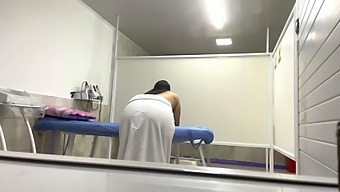 A Mature Nurse With Big Natural Tits Oils Up A Patient'S Fat Ass In The Office